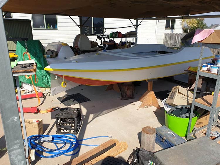 Pride Cheetah Ski boat on timber stands ready to repaint the hull